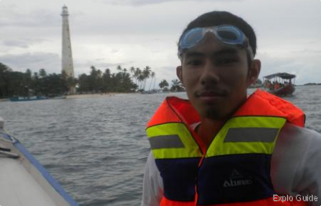 me in boat with lighthouse backgroud ExploGuide - Off the Path Travel and Alternative Tourism database