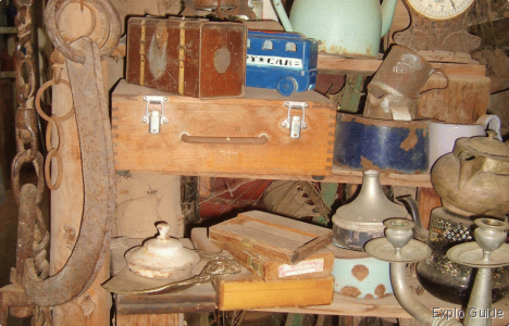 Display in the Beer Bottle House ExploGuide - Off the Path Travel and Alternative Tourism database
